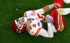 Kansas City quarterback Patrick Mahomes lay on the field in pain after aggravating an ankle injury during the Super Bowl but returned to lead the Chiefs to victory over Philadelphia