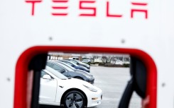 The Biden administration reached a deal to ensure that non-Tesla brand electric vehicles can fuel up at some Tesla charging stations