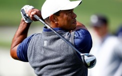 Tiger Woods practices on the range prior to The Genesis Invitational at Riviera Country Club in California