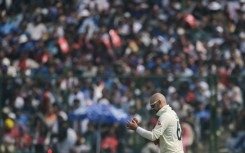 Australia's Nathan Lyon prepares to bowl during the second day of the second Test between India and Australia on February 18