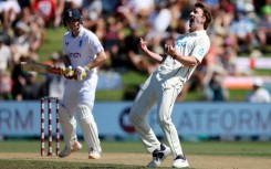 New Zealand's Blair Tickner (R) celebrates his wicket of England's Harry Brook (L) during day three of the first Test at Bay Oval