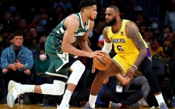 NBA All-Star Game captains Giannis Antetokounmpo, left, and LeBron James, right, missed events on the eve of the annual showdown of elite talent