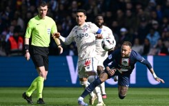 Neymar was stretchered off after turning his ankle in this challenge against Lille
