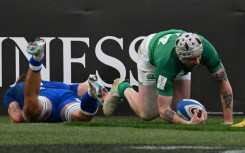 Mack Hansen (R) scored two tries in Ireland's win over Italy