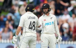 New Zealand's Devon Conway (right) celebrates reaching 50 with teammate Tom Latham