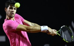 Spain's Carlos Alcaraz eyes the ball during in his ATP Rio Open semi-final victory over Chile's Nicolas Jarry