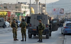 Israeli security forces deploy in the occupied West Bank town of Huwara after the death of two Israelis in a shooting