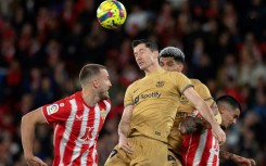 Barcelona's Polish forward Robert Lewandowski is set to miss the Copa del Rey Clasico clash