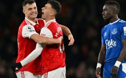 Arsenal's Gabriel Martinelli (C) celebrates scoring against Everton