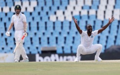 West Indies' Kemar Roach's (R) 11th five-wicket Test haul gave his side a fighting chance of winning the first Test against hosts South Africa 