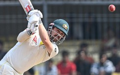 Australia's Travis Head plays a shot during the third day