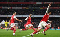 Arsenal celebrates after their late winner against Bournemouth