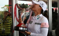 South Korea's Ko Jin-young celebrates after winning her second successive HSBC Women's World Championship title at the Sentosa Golf Club in Singapore