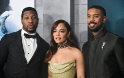 (L-R) Actor Jonathan Majors, actress Tessa Thompson and actor-director-producer Michael B. Jordan arrive for the Los Angeles premiere of 'Creed III' in Hollywood, California, on February 27, 2023