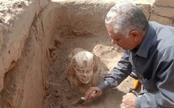 The sphinx statue is unearthed