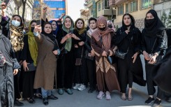 Women stage a rare protest on a Kabul street to mark International Women's Day, calling on the global community to protect Afghans. The United Nations called Afghanistan under the Taliban "the most repressive country in the world" for women's rights