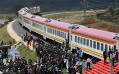 Passengers disembark from the Standard Gauge Railway in Kenya, which was constructed by the Chinese Communications Construction Company and financed by Chinese government