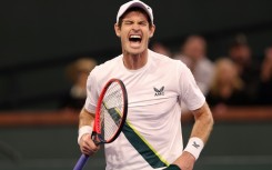 Britain's Andy Murray celebrates his first round victory over Tomas Etcheverry of Argentina at the Indian Wells WTA and ATP Masters