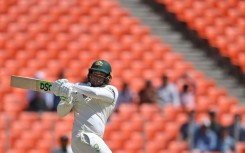 Australia's Usman Khawaja plays a shot during the second day of the fourth and final Test