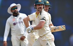 Travis Head and Marnus Labuschagne run between the wickets in Ahmedabad