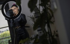 The friends summarise the news in one-minute videos and post them to TikTok