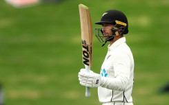 Devon Conway celebrates his half century for New Zealand against Sri Lanka at the start of the rain-affected second Test in Wellington on Friday