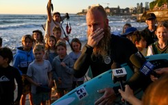 Blake Johnston shredded the world record for the longest surfing session, dodging swarms of jellyfish to ride hundreds of waves across 40 punishing hours