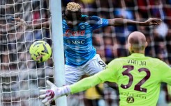 Victor Osimhen (L) scored two headers as Napoli continued their march towards the title