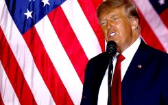 Former US President Donald Trump, seen here in a 2022 appearance at his Mar-a-Lago resort in Florida, has said he expects to be 'arrested' in connection with an inquiry into an alleged hush money payment to a porn star 
