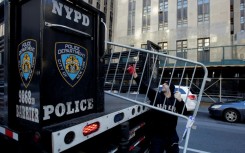 New York police officers set up barricades outside the Manhattan District Attorney's office in New York City on March 20, 2023, ahead of the possible indictment of Donald Trump