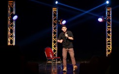 Yusef Bataineh, a graduate of the Amman Comedy Club, performs on stage at Al-Shams theatre