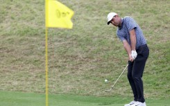 Top-ranked Scottie Scheffler plays a shot on the 11th hole in his victory in an opening group stage match at the WGC Match Play Championship