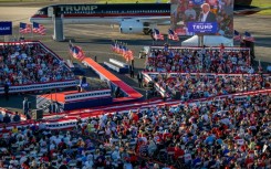 Former US president Donald Trump's plane served as part of the backdrop for his rally in Waco, Texas on March 25, 2023