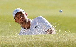 World number one Scottie Scheffler made a late run to defeat J.T. Poston