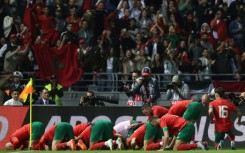 Celebration: Morocco's players after  their second goal 