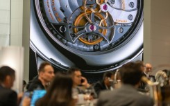 Optimism at the Geneva fair was somewhat dampened by the angst surrounding the banking sector