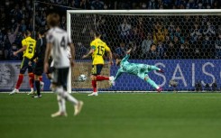 Japan's Kaoru Mitoma scores in the first half but it was not enough to hold out Colombia, who won their friendly in Osaka 2-1