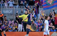 Barcelona's Swedish left-back Fridolina Rolfo celebrates scoring her team's first goal against Roma at Camp Nou