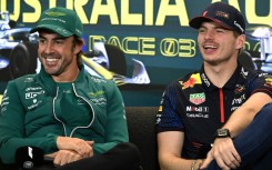Red Bull's Max Verstappen (R) and Aston Martin's Spanish driver Fernando Alonso in Melbourne