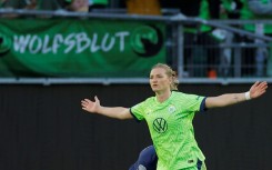 Wolfsburg forward Alexandra Popp celebrates after scoring against Paris Saint-Germain