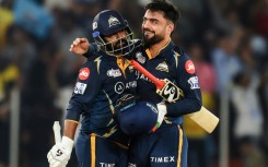 Winning moment: Gujarat Titans' Rahul Tewatia (left) and Rashid Khan celebrate victory