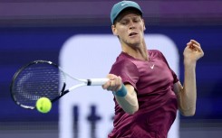 Italy's Jannik Sinner is through to the final of the Miami Open after beating defending champion Carlos Alcaraz of Spain