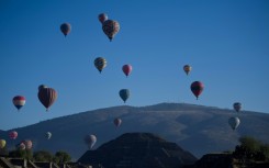 Hot-air balloons are seen flying over the Teotihuacan archeological site, not far from Mexico City, in March 2023