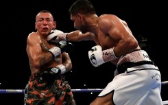 Britain's Amir Khan (right) has been handed a two-year doping ban