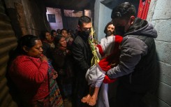 The faithful in Guatemala City carry an image of Jesus through the streets as part of their traditional Easter celebrations