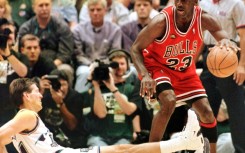 Michael Jordan in June 1998 in Salt Lake City, Utah, leaving a competitor helplessly looking on