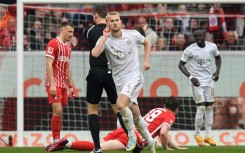 Matthijs de Ligt (C) celebrates what proved to be the winner for Bayern Munich against Freiburg