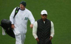 Tiger Woods withdrew from the final day of the Masters on Sunday citing injury