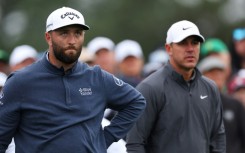Spain's third-ranked Jon Rahm, left, and four-time major winner Brooks Koepka of the United States looked set for a final-round Masters duel