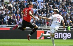 Amine Gouiri (L) scored the opener for Rennes but hosts Lyon hit back with three goals
